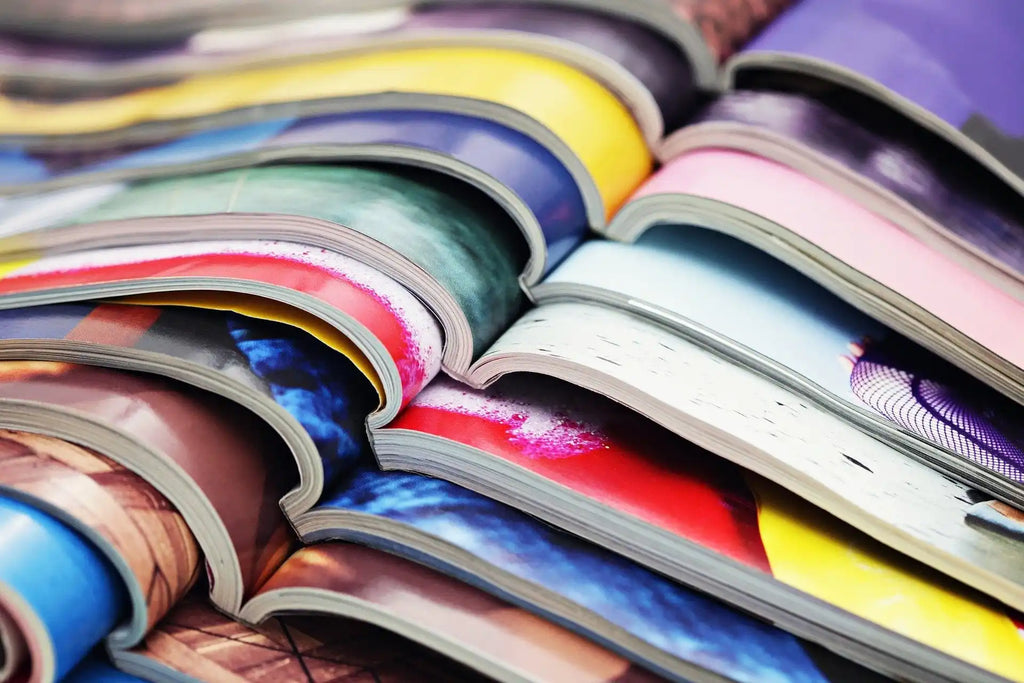 Stack of colorful magazines.